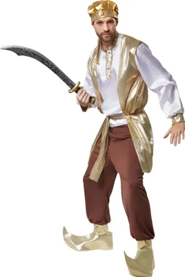 A man dressed as a sultan holding a sword.