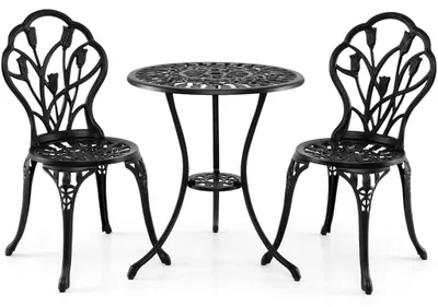 Productafbeelding van Een 3-delige bistroset van gegoten aluminium met een opening voor een parasol