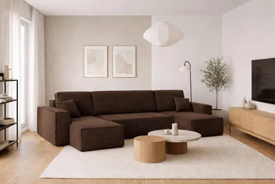 A modern living room with a large sectional sofa.