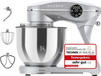 A silver and white KLAMER kitchen machine with various attachments displayed next to it, along with a review badge.