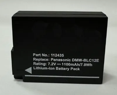 A black battery pack with text labels.