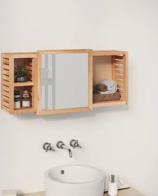 A wooden medicine cabinet with a mirror above a sink and faucet.