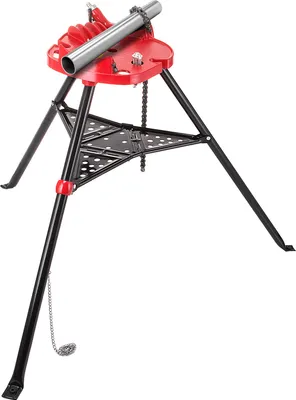 A red and black pipe vise stand with a metal pipe clamped in it, isolated on a white background.