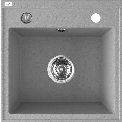 A top-down view of a gray granite kitchen sink with a drain and a faucet hole.