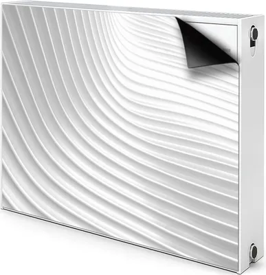 A white radiator cover with a wavy, textured pattern.