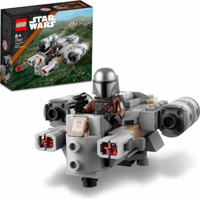 A LEGO Star Wars Razor Crest Microfighter set with a Mandalorian figure is displayed in front of its packaging.