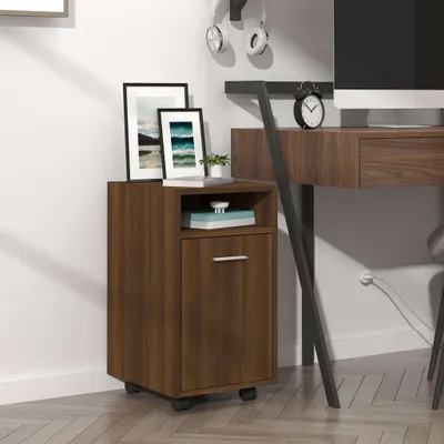 A small wooden cabinet with a drawer and an open shelf, placed next to a desk.