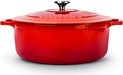 A red cast iron pot with a lid, shown from the front.