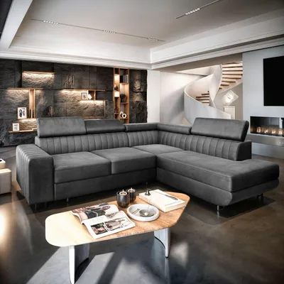 A modern living room with a large sectional sofa, a spiral staircase, and a fireplace.