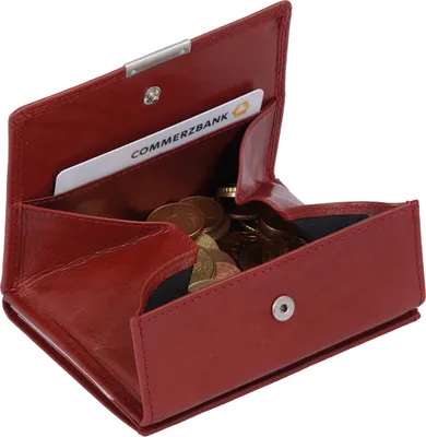 An open red leather wallet with coins and a bank card inside.