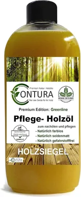 A bottle of wood oil with a label showing a forest scene and product details.