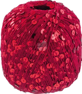 A ball of red yarn with sequins.