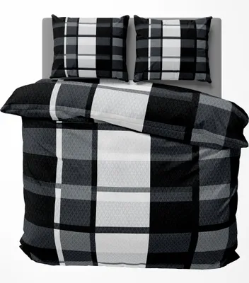 A plaid patterned duvet cover and two pillowcases are laid out on a bed.