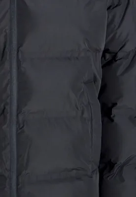 Close-up view of a dark-colored puffer jacket.