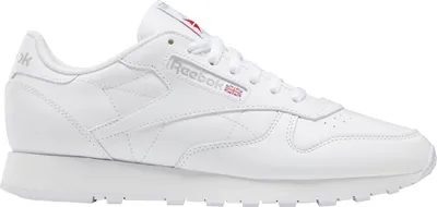 A side view of a white Reebok Classic Leather sneaker.