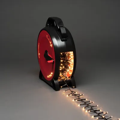Produktbild von Konstsmide Micro LED Compactlights mit Kabelaufroller, 1000 warm weiße Dioden, 30V, Außen (IP44), schwarzes Kabel - 3849-100