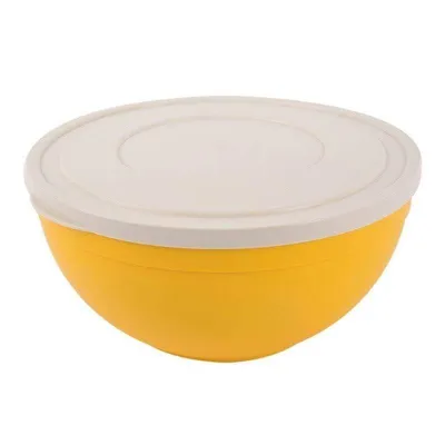 A yellow mixing bowl with a white lid, shown from a side-angle.