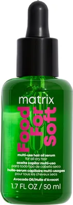 A studio shot of a green glass bottle with a black dropper top, containing hair oil serum.