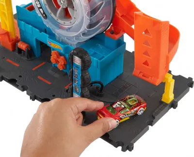 Produktbild von Hot Wheels City Super Reifenshop Spielset, Geschenk für Kinder von 4 bis 8 Jahren