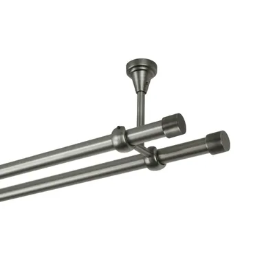 A double curtain rod system mounted to a ceiling.
