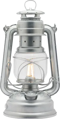 A silver metal lantern with a clear glass globe, illuminated by an internal LED bulb.