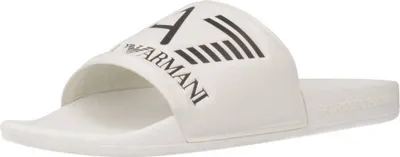 A white slide sandal with a black logo.
