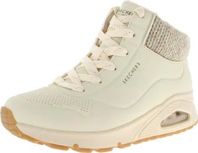 A single cream-colored Skechers bootie is shown against a white background.