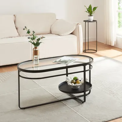 A living room scene with a couch, coffee table, and side table.