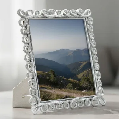 Obrázek produktu pro Fotorámeček ze stříbrné pryskyřice 26x2,2x31,3 cm (vnitřní rozměr 20x25 cm)