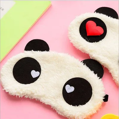 Imagen del producto de Mascarilla para dormir, ideal para la relajación y el descanso. Diseño de ojos de panda, ayuda a combatir la fatiga, perfecta para viajes