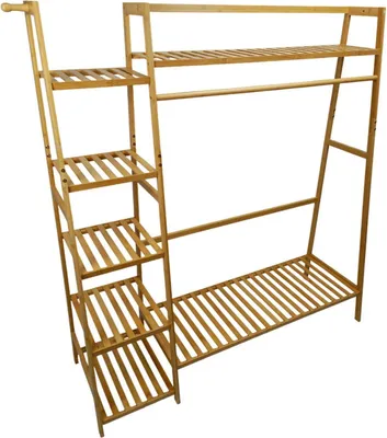 A bamboo shelving unit with multiple shelves and a hanging rod, presented against a white background.