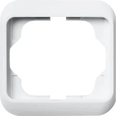 A white frame for an electrical outlet or switch.