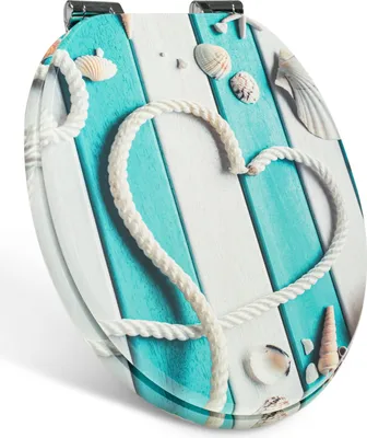 A toilet seat with a beach-themed design featuring a rope heart, seashells, and a wooden plank pattern.