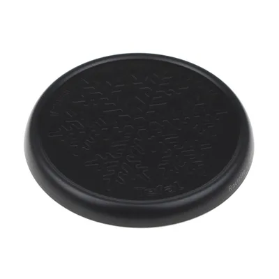 A black round grill plate with a snowflake pattern and brand name embossed on it.
