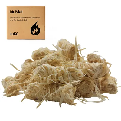 A box of bioMat natural firelighters made from wood wool is shown next to a pile of the firelighters.
