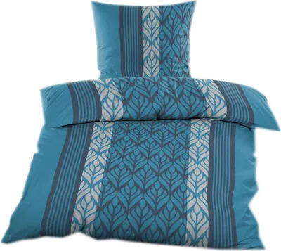 A folded duvet cover and pillowcase set with a leaf pattern.
