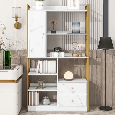 A white and gold bookshelf with various decorative items and books on display, set against a wood-paneled wall.