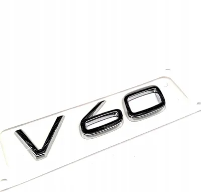 Immagine prodotto di Emblema del portellone posteriore originale Volvo V60 31333642, nuovo da concessionario autorizzato