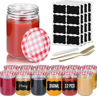A set of glass jars with red and white checkered lids, along with labels and a pen, are displayed on a white background.