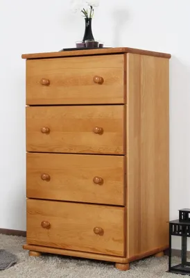 A wooden chest of drawers with a vase of flowers on top, set against a white wall.