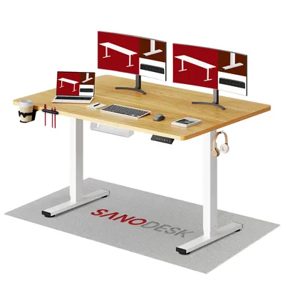 A standing desk setup with monitors, laptop, keyboard, mouse, and accessories.
