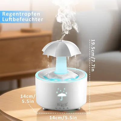 A humidifier shaped like an umbrella, emitting mist, placed on a wooden table.