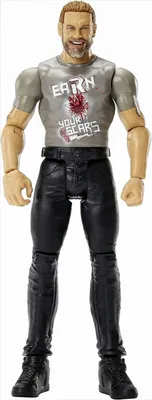 A full-body studio shot of a wrestling action figure.