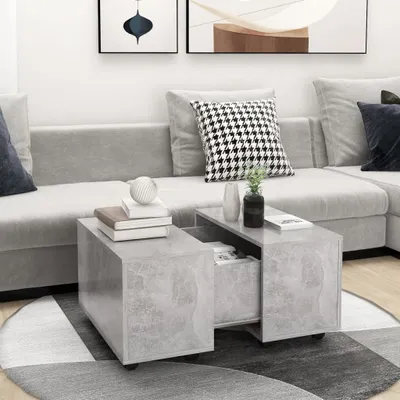 A modern living room scene featuring a sectional sofa and a concrete-look coffee table.