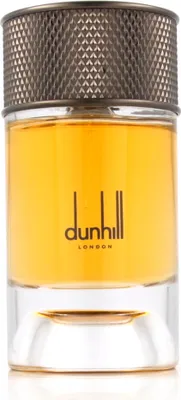 A close-up studio shot of a Dunhill perfume bottle.