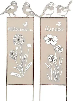 Two garden stakes with decorative cutouts and text.