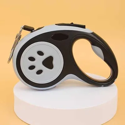 Produktbild von Automatische Hundeleine, C-förmig, für kleine und mittelgroße Hunde, geeignet für Alltagsgebrauch.
