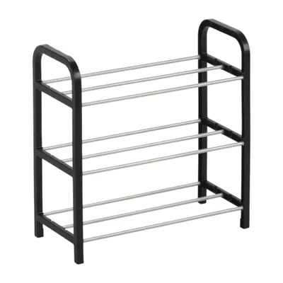 A black and silver shoe rack with four shelves.