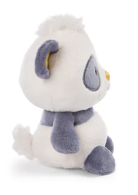 A side view of a plush panda toy sitting down.