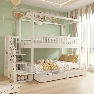 A white bunk bed with stairs and storage drawers in a room with light green walls and a window with curtains.